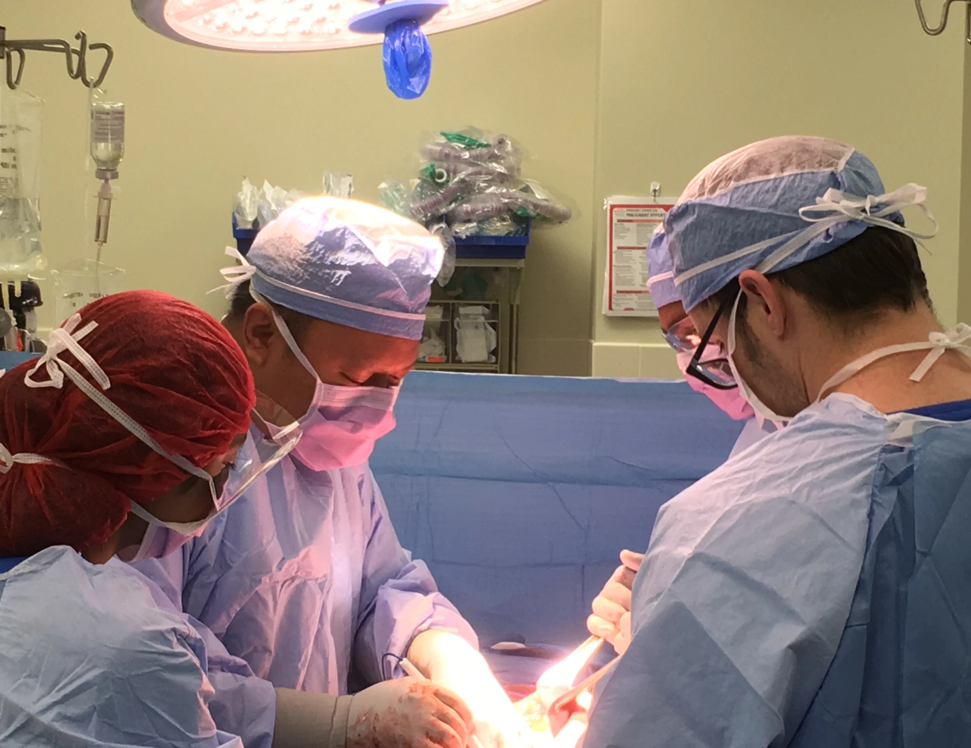 Surgeons performing an operation