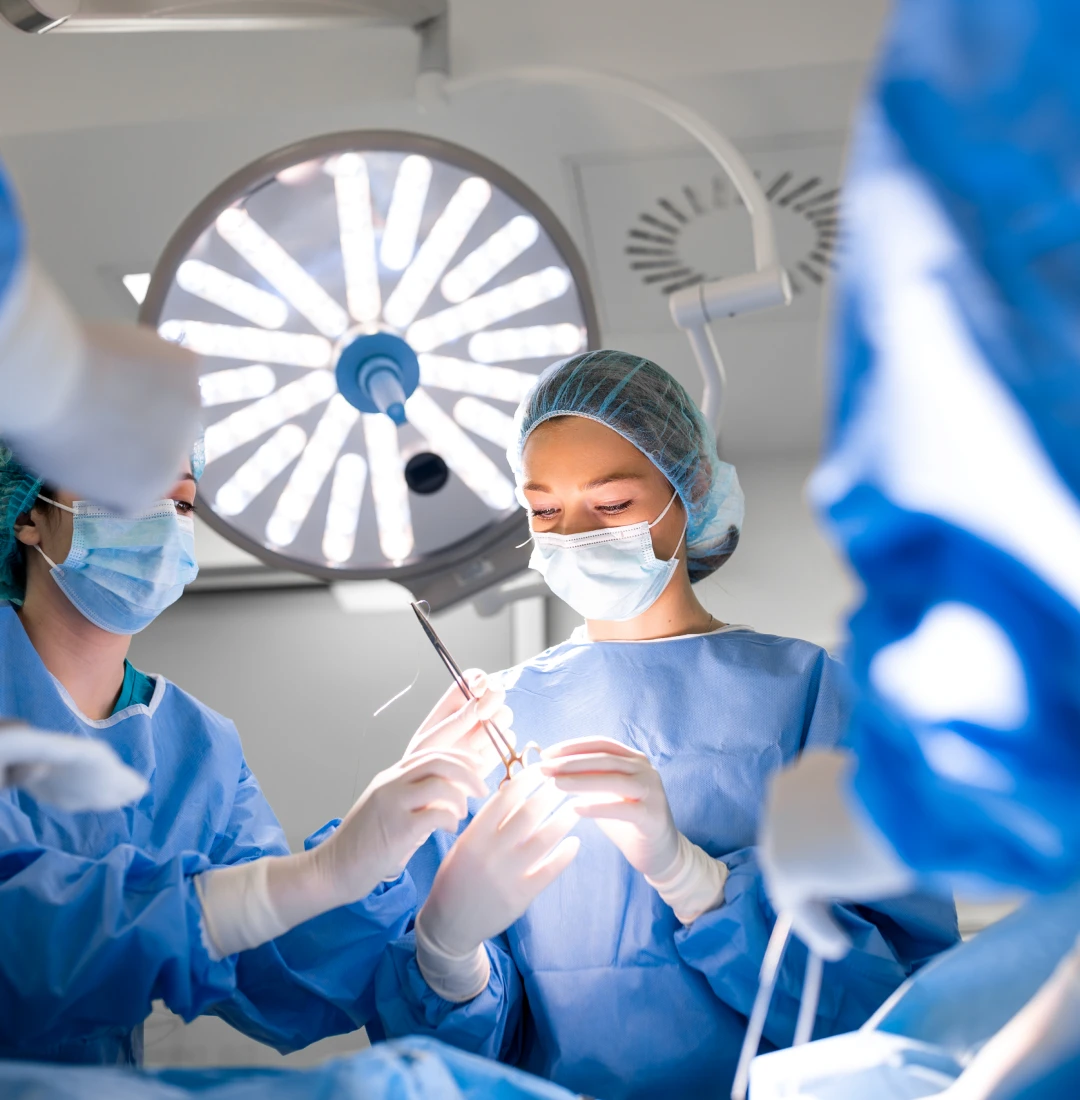 Doctors in surgical attire during operation