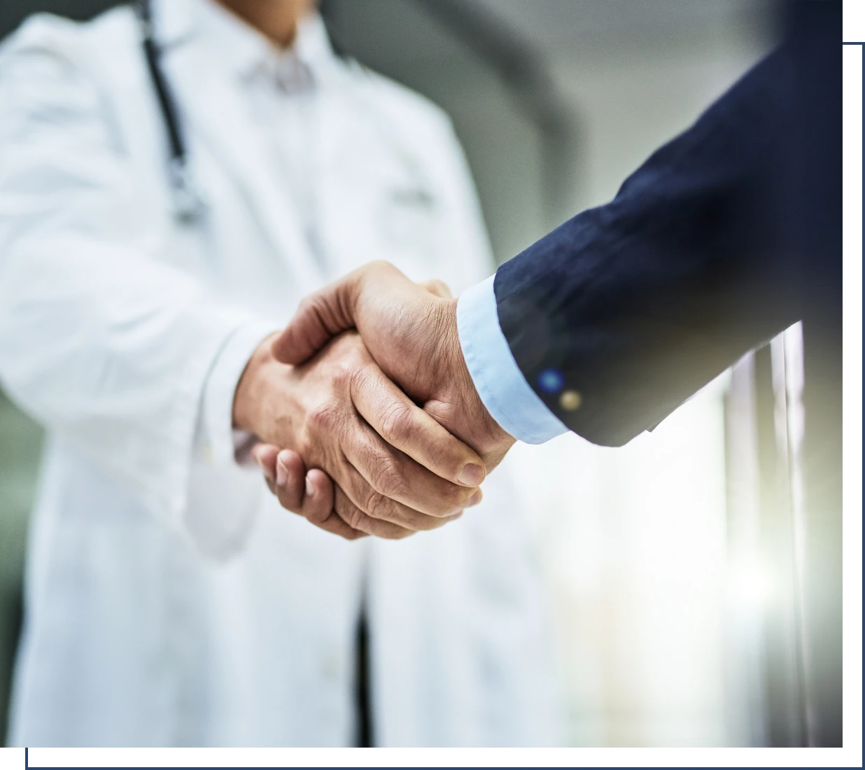 Handshake with doctor in hospital